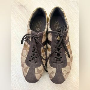 Coach lace up sneaker, suede trim in good condition. Size 8.5